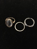 Lot of Three Various Size & Style Alloy Ring Bands, One Triple Rolling, One Mood & One Classic Band