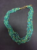 Eleven Strands of Multi Gemstone Beaded 22in Long Brass Clasp Necklace