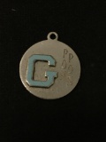 Disc with G Pom Pon Etched on It Sterling Silver Charm Pendant