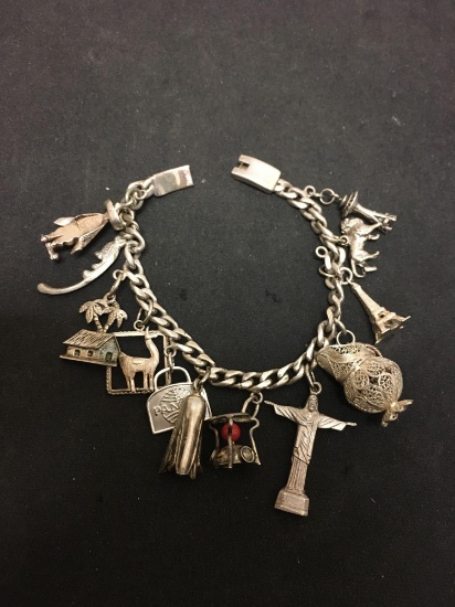 Loaded 7 Inch Sterling Silver Charm Bracelet W/ Silver Charms From Around The World - 40 Grams