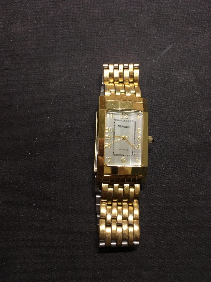 Gruen Designed Rectangular 25x17mm Faceted Crystal Face Gold-Tone Stainless Steel Watch w/ Bracelet