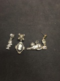 Lot of Four Silver-Tone Alloy Items, Two Mismatched Single Earrings, One Cat Charm & One Child Charm