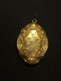 Floral Filigree Decorated 1.5in Tall Oval Gold-Tone Fashion Locket Pendant