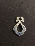 Blue Rhinestone Encrusted Signed Designer 1.25in Long Filigree Design Sterling Silver Pendant