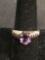 Oval Faceted 9x7mm Amethyst Center Groove Detailed Shoulders Sterling Silver Ring Band