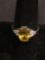 Oval Faceted 10x8mm Yellow CZ Center w/ Six Round White CZ Sides High Polished Sterling Silver Ring