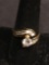 Round 6mm CZ Center w/ Channel Set Graduating Baguette Sides Bypass Gold-Tone Signed Designer