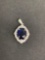 Oval Faceted 10x8mm Created Blue Sapphire Center Scallop Halo High Polished Sterling Silver Pendant