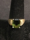 Emerald Cut Faceted 10x8mm Green Gem Center Gold-Tone 7mm Wide Tapered Groove Detail Signed Designer