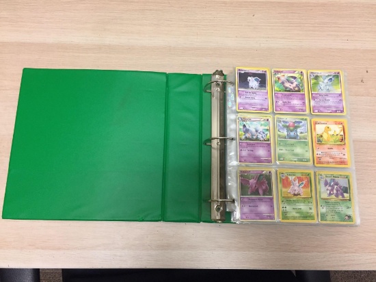 Binder Full of Pokemon Cards from Collection