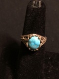 Oval 9x7mm Turquoise Cabochon Center Filigree Heart Decorated Sterling Silver Ring Band