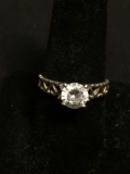 Round Faceted 7mm CZ Center w/ Alternating Ribbon Heart Decorated Sides Signed Designer Sterling