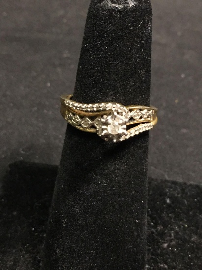 Round Faceted Illusion Set Diamond Center w/ Diamond Accented Ribbons Gold-Tone Bypass Sterling