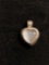Heart Shaped White Cat's Eye Cabochon Center Set in 20x13mm Sterling Silver Cage Pendant