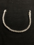QCD Designer Round Faceted 4mm CZ Decorated 7in Long Sterling Silver Tennis Bracelet