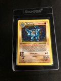 POKEMON MEGA COLLECTION - 1st Edition Shadowless Holo Machamp 8/102