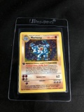 POKEMON MEGA COLLECTION - 1st Edition Shadowless Holo Machamp 8/102