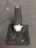 Bezel Set Oval 8x6mm Quartz Cabochon Center Scallop Halo Detail Split Shank Sterling Silver Ring