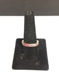 KC Designer Channel Set Round Faceted Pink CZ Featured Gold-Tone Sterling Silver Eternity Band