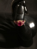 Oval Checkerboard Faceted 8x6mm Rubellite Center w/ Round White CZ Halo & Rubellite Baguette Sides