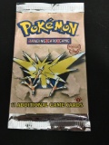 FACTORY SEALED Pokemon 11 Card Booster Pack - 1st Edition Fossil