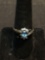 Oval Faceted 5.5x3.5mm Blue Topaz Center w. Sapphire Marquise & Round CZ Accented Bypass Vintage