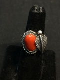 Oval 14x8mm Polished Coral Cabochon Center Feather & Rope Decorated Old Pawn Native American