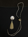 Lot of Two Gold Accented Oval 40x30mm Resin Bolo w/ 34in Long Nylon Cord & Round 40mm Mother of