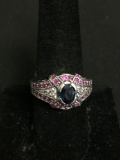 Oval Faceted 7x5mm Blue Sapphire Center w/ Pink & White Round CZ Accents 12mm Wide Tapered Signed