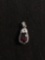Oval Faceted 7x5mm Created Ruby Center w/ Trillion Faceted CZ Accent Sterling Silver Pendant