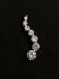 Seven Graduating 2mm - 6mm Round Faceted CZ Featured Signed Designer Sterling Silver Journey Pendant