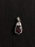 Oval Faceted 7x5mm Created Ruby Center w/ Trillion Faceted CZ Accent Sterling Silver Pendant