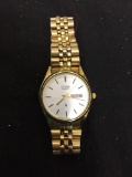 Citizen Designer Round 33mm Bezel Date w/ Quartz Movement Gold-Tone Water Resistant Stainless Steel