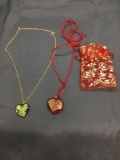 Lot of Two Hand-Forged Foiled Glass Heart Shaped Pendants One w/ Silk Cord & One w/ Alloy Chain