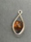 Teardrop Shaped 20mm Long Sterling Silver Ribbon Pendant w/ Round 7mm Amber Bead Center