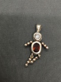 Dancing Boy Motif 25mm Long Sterling Silver Pendant w/ Oval Faceted 6x4mm Garnet w/ Round CZ Accent