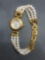 Lee Sands Designer Round 15mm Mother of Pearl Face Gold-Tone Stainless Steel Watch w/ Triple Faux