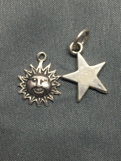 Lot of Two Sterling Silver Charms, One Sun Face & One Star