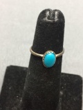 Oval 8x5mm Turquoise Cabochon Center Sterling Silver Ring Band