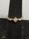 Kite Set Princess Faceted CZ Center w/ Round CZ Accents Signed Designer Gold-Tone Sterling Silver