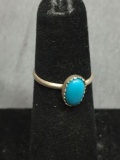 Oval 8x5mm Turquoise Cabochon Center Sterling Silver Ring Band