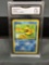 GMA Graded 1999 Pokemon Fossil 1st Edition PSYDUCK Trading Card - NM+ 7.5