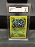 GMA Graded 1999 Pokeman Base Set Unlimited TANGELA Trading Card - MINT 9