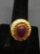 Oval 12x9mm Ruby Cabochon Center w/ Round Garnet Accented Halo Filigree Decorated Gold-Tone Sterling