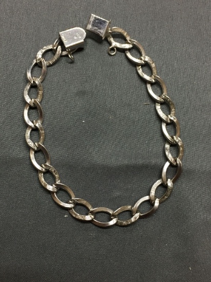 Wells Designer Medium Gauge Textured Curb Link 7mm Wide 7in Long Sterling Silver Bracelet