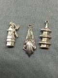 Lot of Three Sterling Silver Charms, One Chinese Pagoda, Windmill & Fleur De Lis