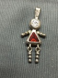 Trillion Faceted 5x5x5mm Garnet Center w/ Round CZ Accent Dancing Girl Themed Sterling Silver