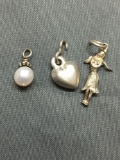 Lot of Three Sterling Silver Charms, One Hula Girl, Heart & Pearl Charms