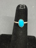 Oval 8x5mm Turquoise Cabochon Center Sterling Silver Ring Band