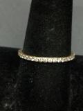 Shared Prong Set Round Faceted CZ Featured 1.75mm Wide Gold-Tone Sterling Silver Eternity Band